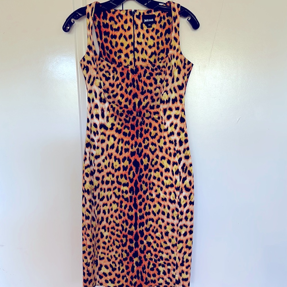 Slim fitting cocktail dress, animal print. Size 4, back zipper